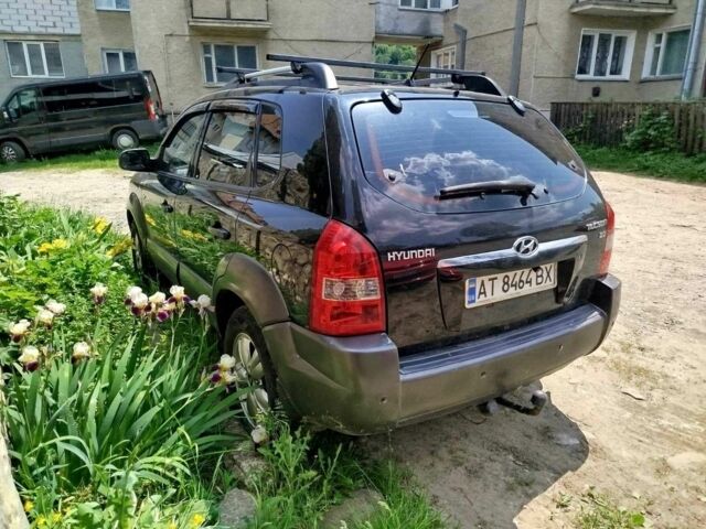 Черный Хендай Туксон, объемом двигателя 2 л и пробегом 223 тыс. км за 7500 $, фото 4 на Automoto.ua