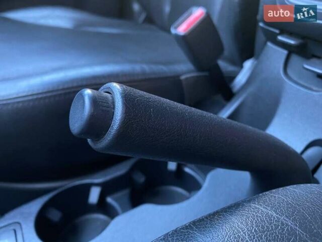 Черный Хендай Туксон, объемом двигателя 1.98 л и пробегом 286 тыс. км за 7300 $, фото 17 на Automoto.ua