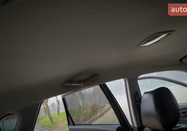 Чорний Хендай Туксон, об'ємом двигуна 2 л та пробігом 229 тис. км за 8600 $, фото 139 на Automoto.ua