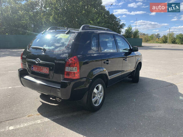 Чорний Хендай Туксон, об'ємом двигуна 2 л та пробігом 56 тис. км за 9500 $, фото 34 на Automoto.ua