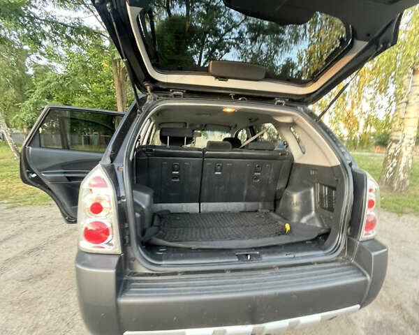 Чорний Хендай Туксон, об'ємом двигуна 2 л та пробігом 204 тис. км за 7800 $, фото 39 на Automoto.ua