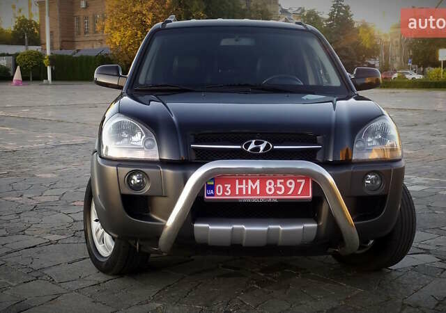 Черный Хендай Туксон, объемом двигателя 2 л и пробегом 230 тыс. км за 8600 $, фото 21 на Automoto.ua