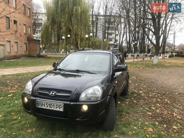 Черный Хендай Туксон, объемом двигателя 2 л и пробегом 210 тыс. км за 8999 $, фото 12 на Automoto.ua