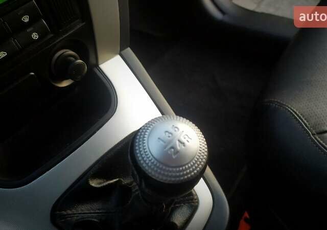 Черный Хендай Туксон, объемом двигателя 2 л и пробегом 230 тыс. км за 8600 $, фото 170 на Automoto.ua