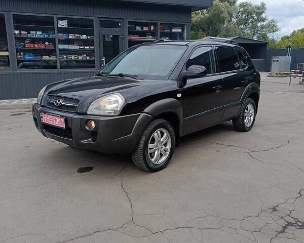 Черный Хендай Туксон, объемом двигателя 2 л и пробегом 255 тыс. км за 8400 $, фото 19 на Automoto.ua