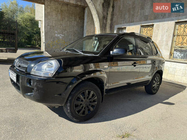 Черный Хендай Туксон, объемом двигателя 2 л и пробегом 189 тыс. км за 8250 $, фото 4 на Automoto.ua