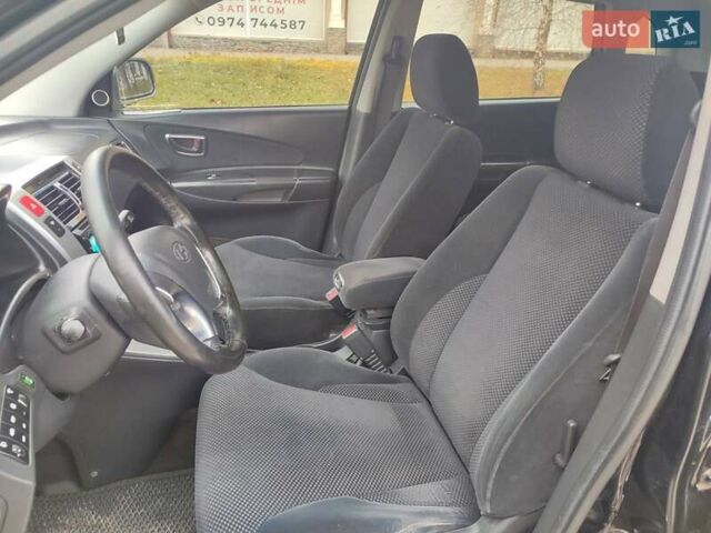 Черный Хендай Туксон, объемом двигателя 2 л и пробегом 270 тыс. км за 6800 $, фото 15 на Automoto.ua