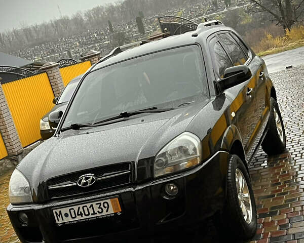 Черный Хендай Туксон, объемом двигателя 2 л и пробегом 151 тыс. км за 9100 $, фото 26 на Automoto.ua