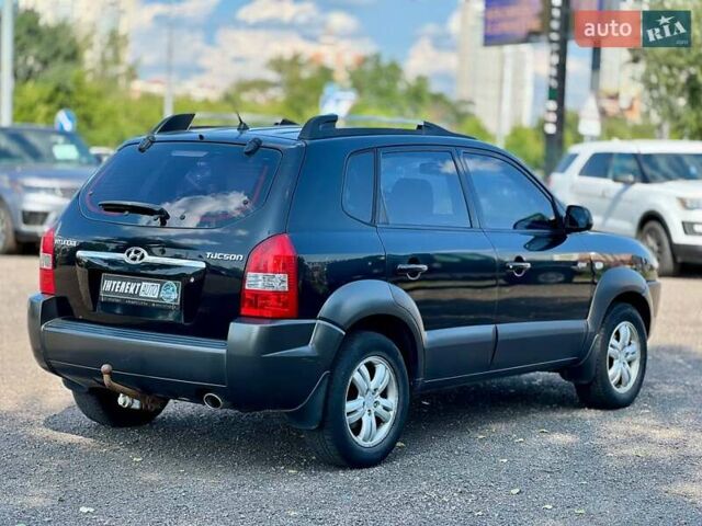 Черный Хендай Туксон, объемом двигателя 2 л и пробегом 227 тыс. км за 8200 $, фото 5 на Automoto.ua