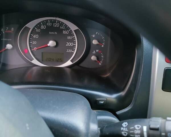 Чорний Хендай Туксон, об'ємом двигуна 2 л та пробігом 204 тис. км за 8000 $, фото 4 на Automoto.ua