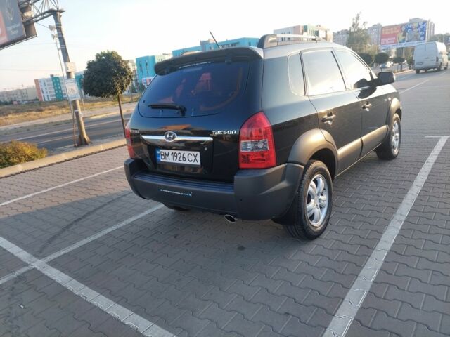 Черный Хендай Туксон, объемом двигателя 2 л и пробегом 289 тыс. км за 6600 $, фото 6 на Automoto.ua