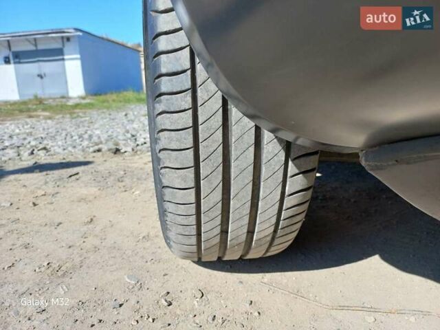 Черный Хендай Туксон, объемом двигателя 2 л и пробегом 219 тыс. км за 8500 $, фото 11 на Automoto.ua