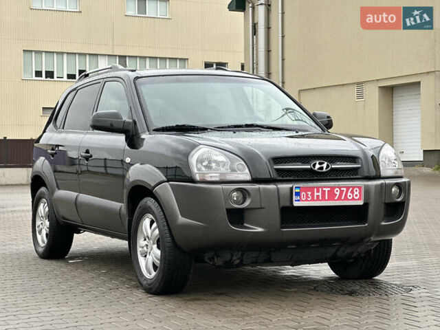 Чорний Хендай Туксон, об'ємом двигуна 2 л та пробігом 230 тис. км за 6850 $, фото 1 на Automoto.ua