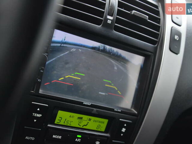 Черный Хендай Туксон, объемом двигателя 2 л и пробегом 183 тыс. км за 9150 $, фото 57 на Automoto.ua