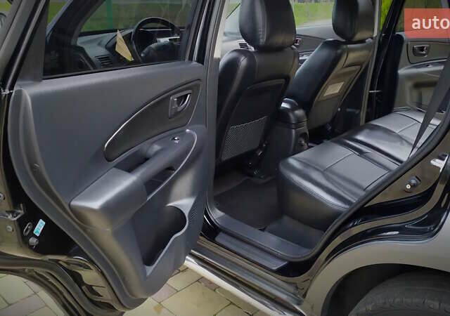 Чорний Хендай Туксон, об'ємом двигуна 2 л та пробігом 229 тис. км за 8600 $, фото 131 на Automoto.ua