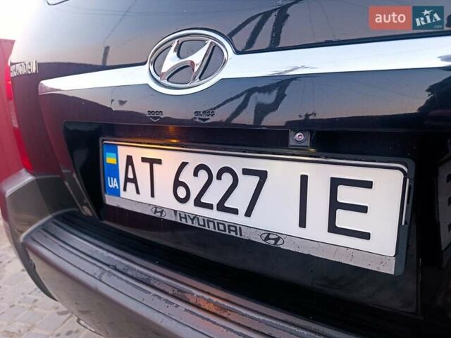 Черный Хендай Туксон, объемом двигателя 2 л и пробегом 280 тыс. км за 9500 $, фото 15 на Automoto.ua