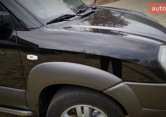 Чорний Хендай Туксон, об'ємом двигуна 2 л та пробігом 229 тис. км за 8600 $, фото 65 на Automoto.ua