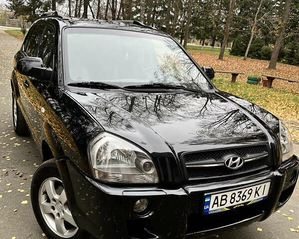 Черный Хендай Туксон, объемом двигателя 1.98 л и пробегом 99 тыс. км за 8999 $, фото 1 на Automoto.ua