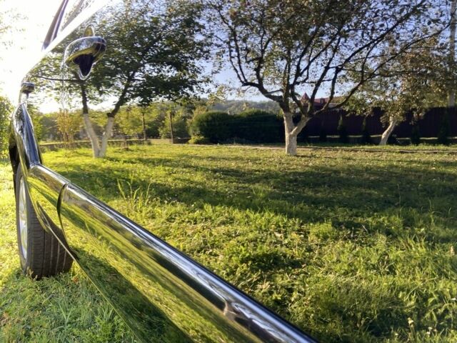 Черный Хендай Туксон, объемом двигателя 2 л и пробегом 197 тыс. км за 8400 $, фото 6 на Automoto.ua