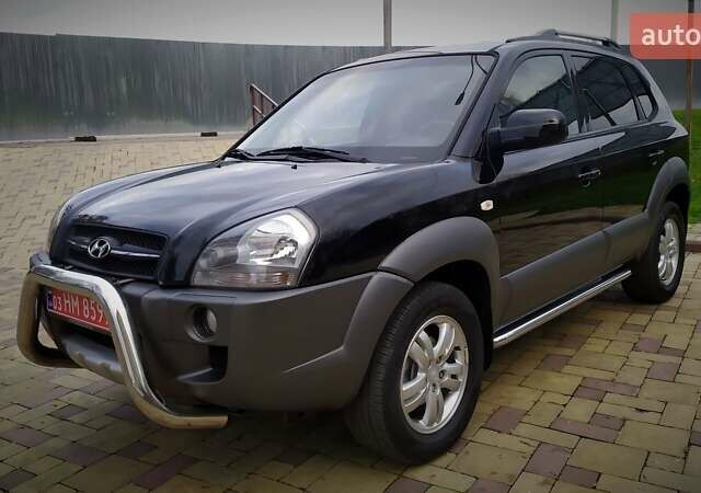 Чорний Хендай Туксон, об'ємом двигуна 2 л та пробігом 229 тис. км за 8600 $, фото 26 на Automoto.ua