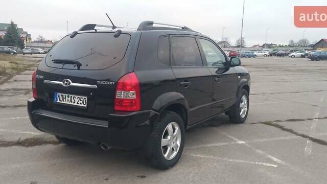 Черный Хендай Туксон, объемом двигателя 1.98 л и пробегом 155 тыс. км за 7999 $, фото 8 на Automoto.ua