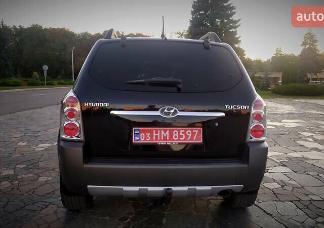 Черный Хендай Туксон, объемом двигателя 2 л и пробегом 230 тыс. км за 8600 $, фото 106 на Automoto.ua