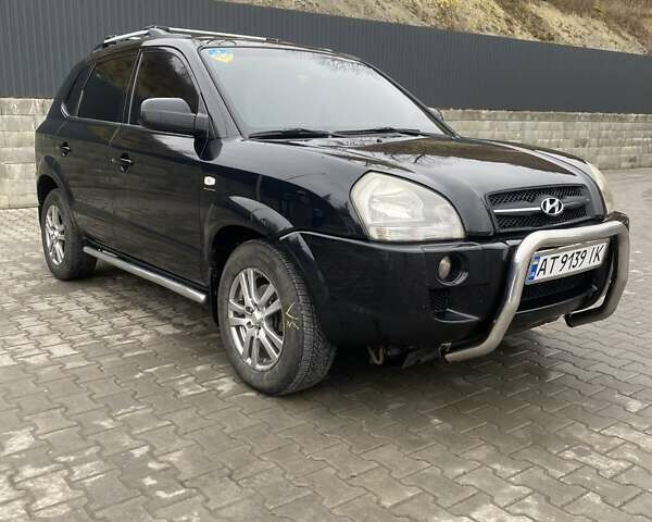 Чорний Хендай Туксон, об'ємом двигуна 1.99 л та пробігом 345 тис. км за 7600 $, фото 2 на Automoto.ua