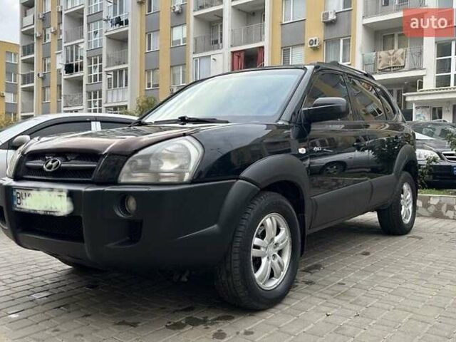 Черный Хендай Туксон, объемом двигателя 1.98 л и пробегом 147 тыс. км за 8000 $, фото 8 на Automoto.ua