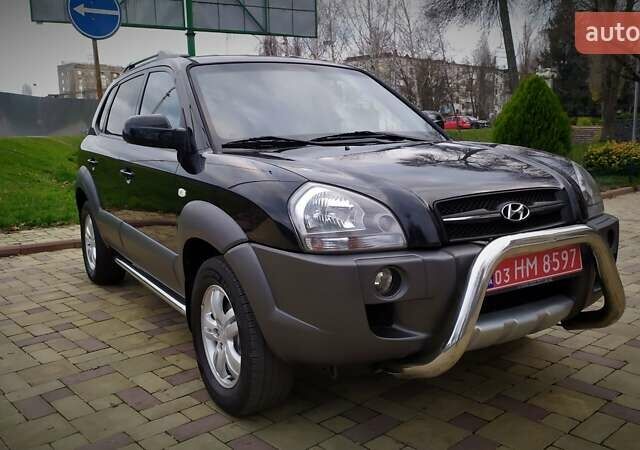 Чорний Хендай Туксон, об'ємом двигуна 2 л та пробігом 229 тис. км за 8600 $, фото 18 на Automoto.ua