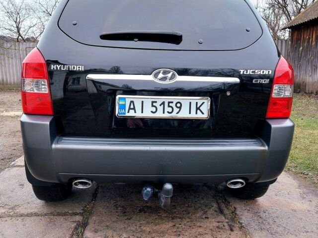 Черный Хендай Туксон, объемом двигателя 2 л и пробегом 272 тыс. км за 7500 $, фото 5 на Automoto.ua