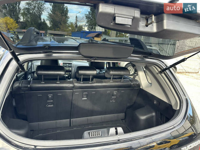 Чорний Хендай Туксон, об'ємом двигуна 2 л та пробігом 180 тис. км за 7999 $, фото 12 на Automoto.ua