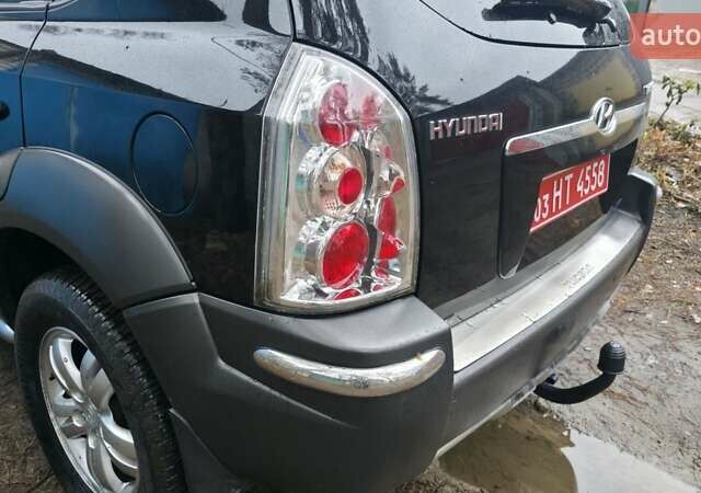 Чорний Хендай Туксон, об'ємом двигуна 2 л та пробігом 207 тис. км за 8200 $, фото 6 на Automoto.ua