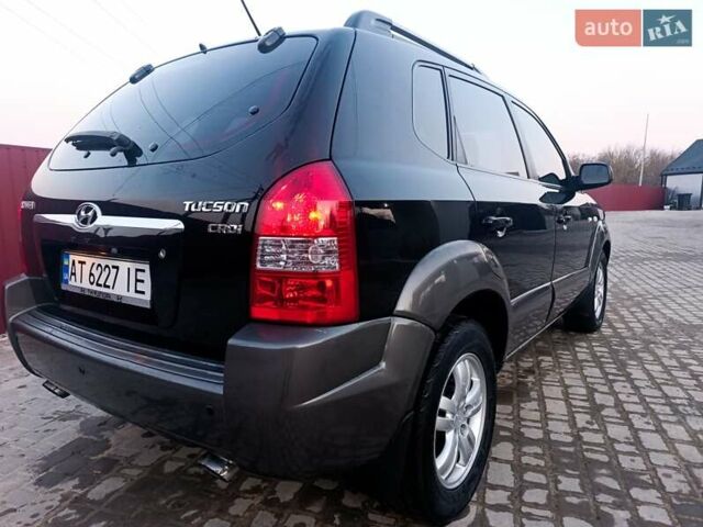 Черный Хендай Туксон, объемом двигателя 2 л и пробегом 280 тыс. км за 9500 $, фото 6 на Automoto.ua