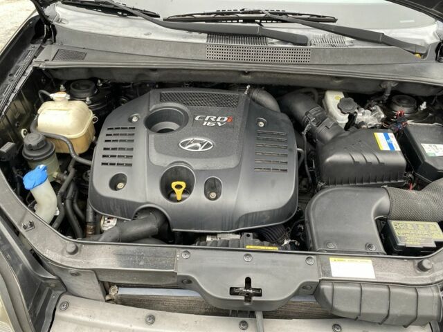 Черный Хендай Туксон, объемом двигателя 2 л и пробегом 330 тыс. км за 4350 $, фото 23 на Automoto.ua