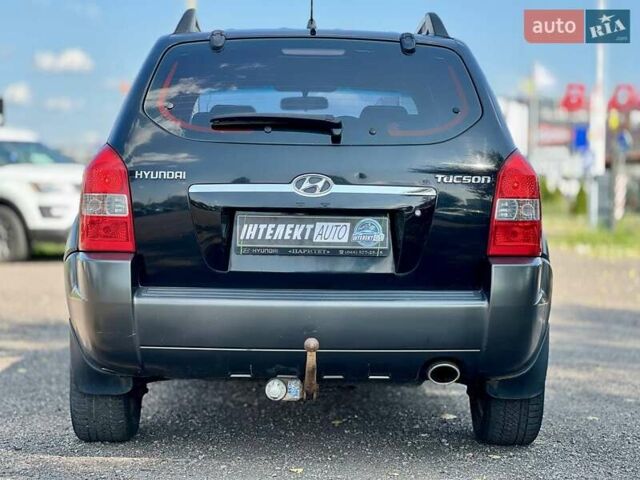Черный Хендай Туксон, объемом двигателя 2 л и пробегом 227 тыс. км за 8200 $, фото 12 на Automoto.ua