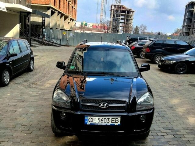 Чорний Хендай Туксон, об'ємом двигуна 2 л та пробігом 190 тис. км за 7500 $, фото 3 на Automoto.ua