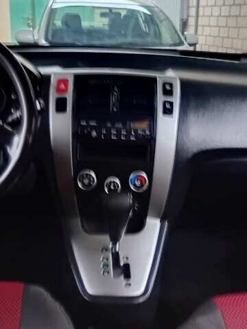 Черный Хендай Туксон, объемом двигателя 1.98 л и пробегом 218 тыс. км за 7800 $, фото 2 на Automoto.ua