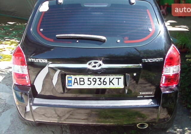 Черный Хендай Туксон, объемом двигателя 1.98 л и пробегом 234 тыс. км за 7800 $, фото 1 на Automoto.ua