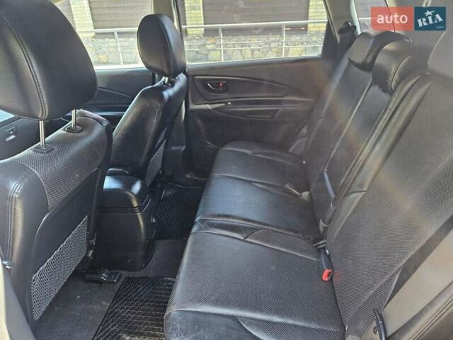Чорний Хендай Туксон, об'ємом двигуна 2 л та пробігом 152 тис. км за 7950 $, фото 8 на Automoto.ua