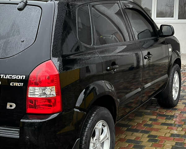 Черный Хендай Туксон, объемом двигателя 2 л и пробегом 151 тыс. км за 9100 $, фото 27 на Automoto.ua