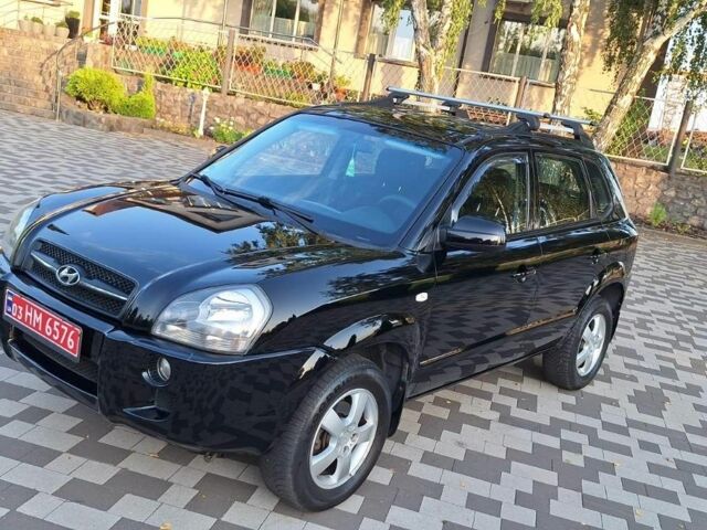Чорний Хендай Туксон, об'ємом двигуна 2 л та пробігом 190 тис. км за 8300 $, фото 8 на Automoto.ua
