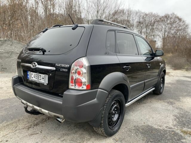 Черный Хендай Туксон, объемом двигателя 2 л и пробегом 330 тыс. км за 4350 $, фото 7 на Automoto.ua