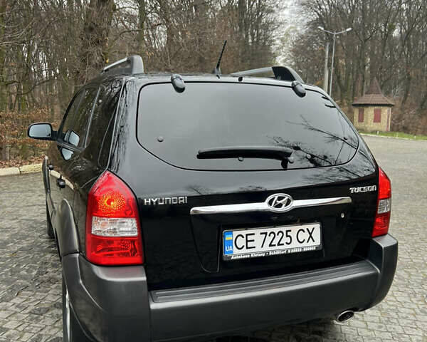 Чорний Хендай Туксон, об'ємом двигуна 1.98 л та пробігом 155 тис. км за 8750 $, фото 2 на Automoto.ua