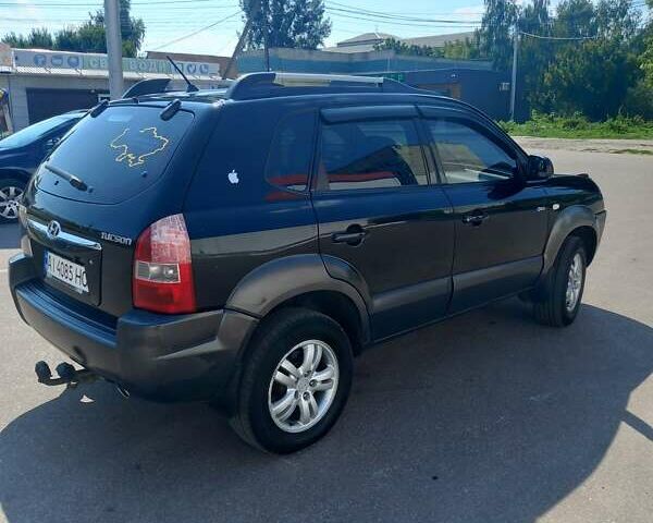 Чорний Хендай Туксон, об'ємом двигуна 1.98 л та пробігом 357 тис. км за 7500 $, фото 14 на Automoto.ua