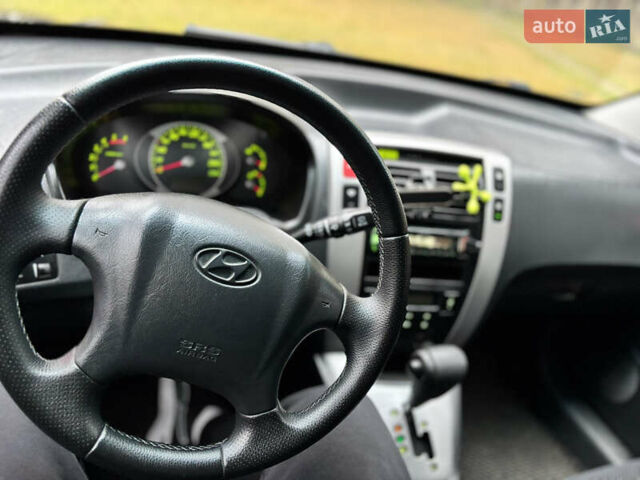 Черный Хендай Туксон, объемом двигателя 1.99 л и пробегом 266 тыс. км за 7500 $, фото 33 на Automoto.ua