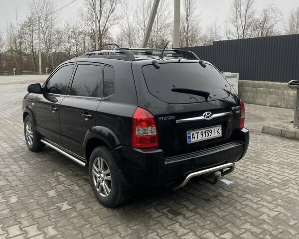 Чорний Хендай Туксон, об'ємом двигуна 1.99 л та пробігом 345 тис. км за 7600 $, фото 9 на Automoto.ua