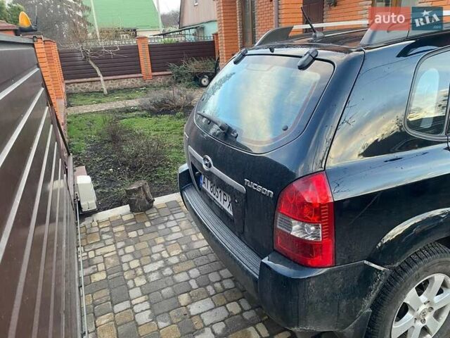 Черный Хендай Туксон, объемом двигателя 2 л и пробегом 84 тыс. км за 8650 $, фото 3 на Automoto.ua