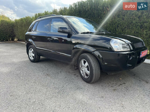 Черный Хендай Туксон, объемом двигателя 2 л и пробегом 256 тыс. км за 7800 $, фото 18 на Automoto.ua