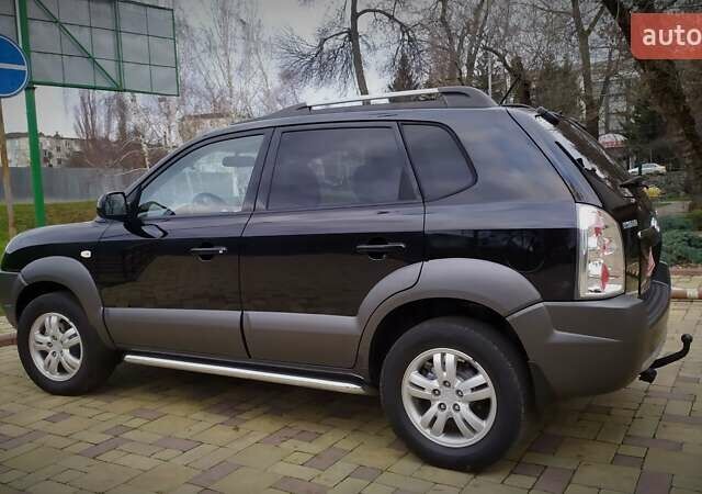 Чорний Хендай Туксон, об'ємом двигуна 2 л та пробігом 229 тис. км за 8600 $, фото 50 на Automoto.ua