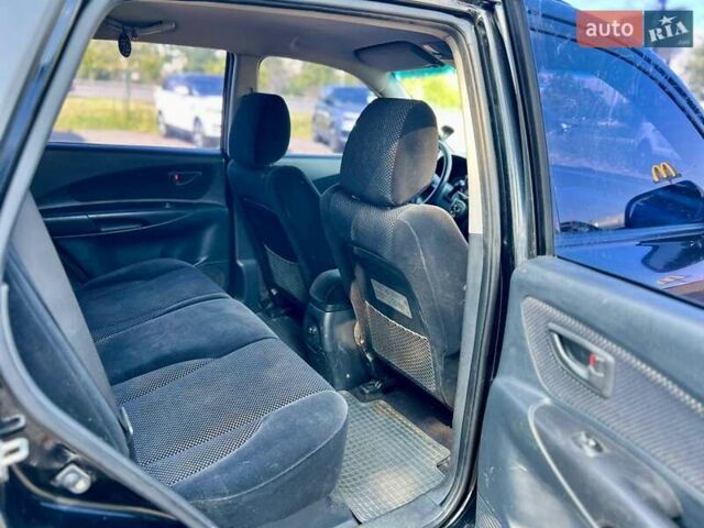 Черный Хендай Туксон, объемом двигателя 2 л и пробегом 227 тыс. км за 8200 $, фото 17 на Automoto.ua